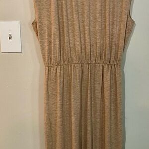 Camel colored fitted at the waist no sleeve ankle length dress.